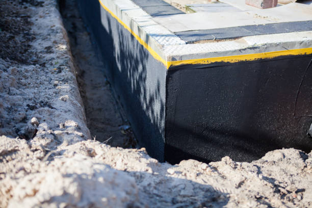 Professional Waterproofing technician working in Haven, KS